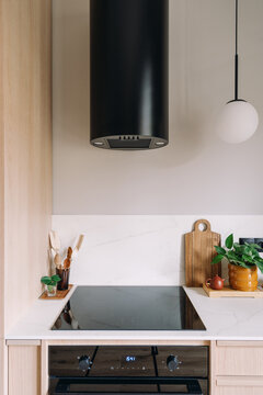 Kitchen induction stove, oven, cooker hood and home decor