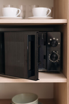 Close up shot of open door of microwave oven