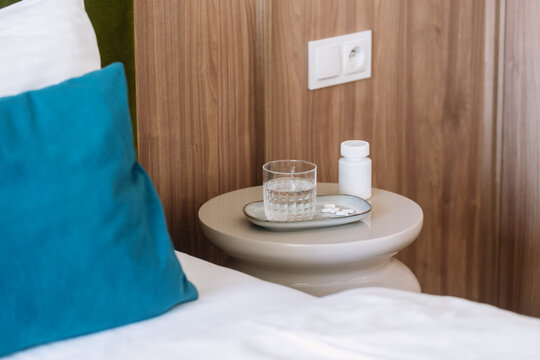 Prescription medicine and pill bottle on a table in a room for health care