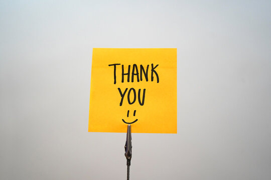 Yellow Thank You Note on Clip