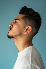 Naklejka premium Side portrait Latinx man person human.