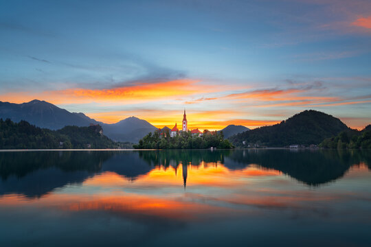 Lake Bled, Slovenia with the Church of the Assumption of the Blessed Virgin Mary at dawn.