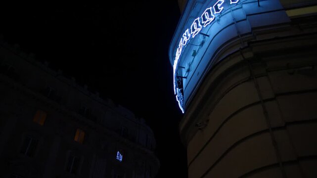 Close View of Blue Illuminated Theatre Sign at Night in Rome Italy Shot with Cinema Camera