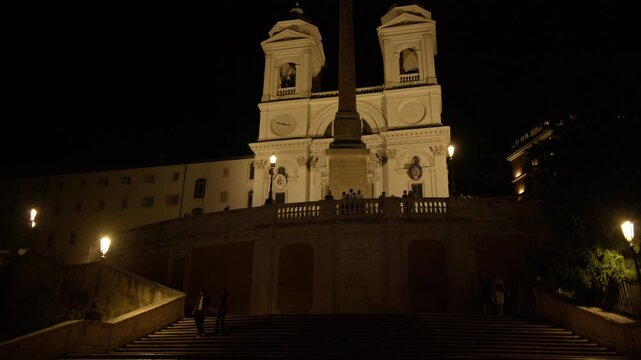 Trinita dei Monti Church Illuminated Above Spanish Steps at Night in Rome Italy Shot with Cinema Camera