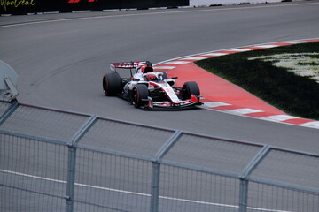 Obraz premium May 24, 2026, Montreal, Canada - Haas Formula 1 car on track by Ocon and Bearman at Circuit Gilles Villeneuve. g.