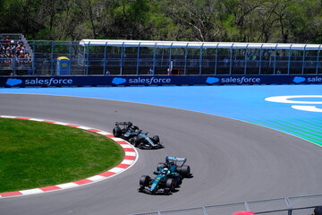 Obraz premium May 24, 2026, Montreal, Canada, Mercedes F1 car racing through Circuit Gilles Villeneuve corner. g.