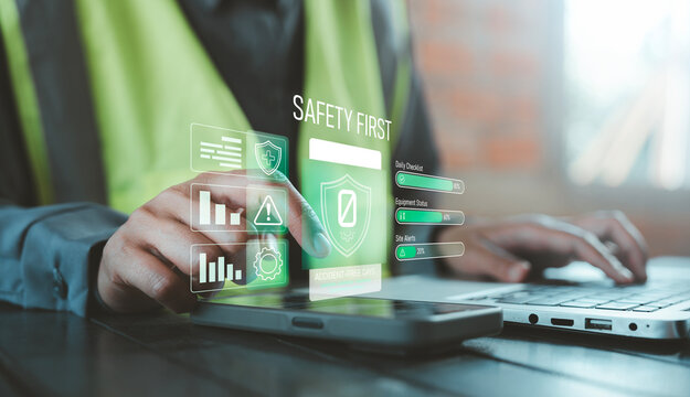 Zero accident free days and safety first concept industrial worker using smartphone with holographic safety tracking dashboard and compliance progress