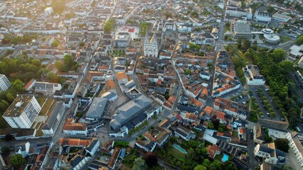 Fototapeta premium Aerial view beside the old town of the city Cholet, France on a sunny summer morning