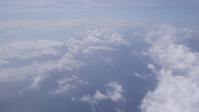 Aerial View Above Clouds During Flight Over Europe Shot with Cinema Camera