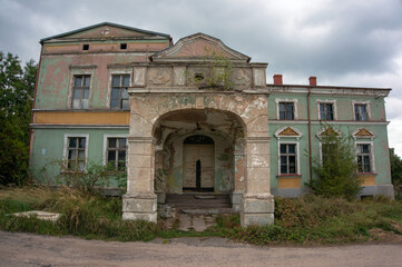 Obraz premium Palace at Kołat Street is disused, built in 1860s, rebuilt at turn of 19th and 20th centuries. Chociwel, Poland.