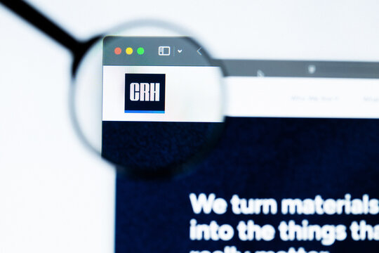 Milan, Italy 2026, 20 Apr Closeup of CRH website on a laptop screen. CRH logo under a magnifying glass.