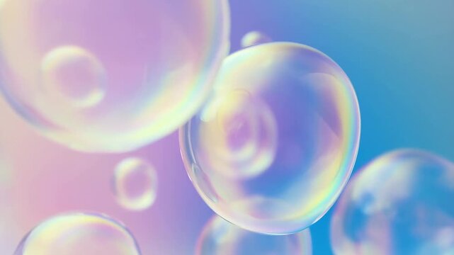 Slow motion tracking shot of soap bubbles drifting and rising across pastel gradient background in close up studio