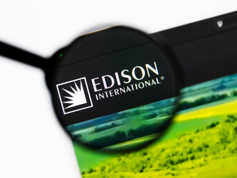 Milan, Italy 2026, 20 Apr Closeup of Edison International website on a laptop screen. Edison International logo under a magnifying glass.