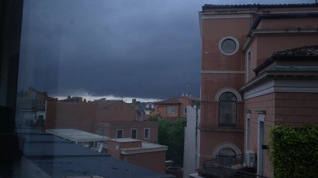 Approaching Thunderstorm Above Rome City Rooftops Italy Shot with Cinema Camera