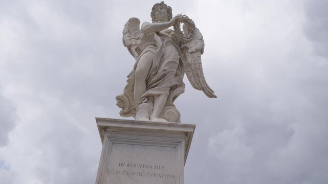 Historic Marble Angel Monument on Bridge of Angels Ponte Sant Angelo Rome Italy Shot with Cinema Camera