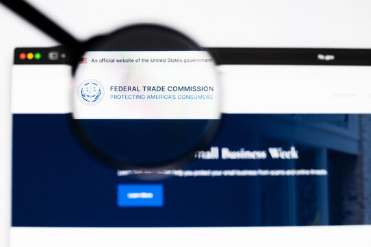 Milan, Italy 2026, 20 Apr Closeup of Federal Trade Commission website on a laptop screen. Federal Trade Commission logo under a magnifying glass.
