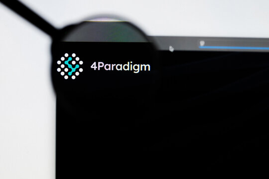 Milan, Italy 2026, 20 Apr Closeup of Fourth Paradigm website on a laptop screen. Fourth Paradigm logo under a magnifying glass.