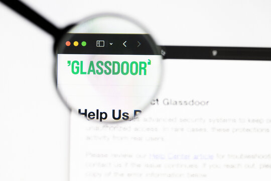 Milan, Italy 2026, 20 Apr Closeup of glassdoor website on a laptop screen. glassdoor logo under a magnifying glass.