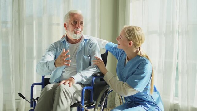 Help support retirement healthcare. Nurse helping old man in wheelchair. Patient and woman in nursing home for medical caregiver. Nurse taking care of paralyzed man in chair for people with disability