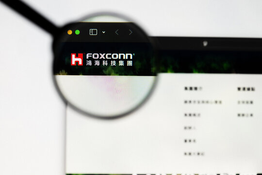 Milan, Italy 2026, 20 Apr Closeup of Hon Hai Precision FOXCONN website on a laptop screen. Hon Hai Precision FOXCONN logo under a magnifying glass.