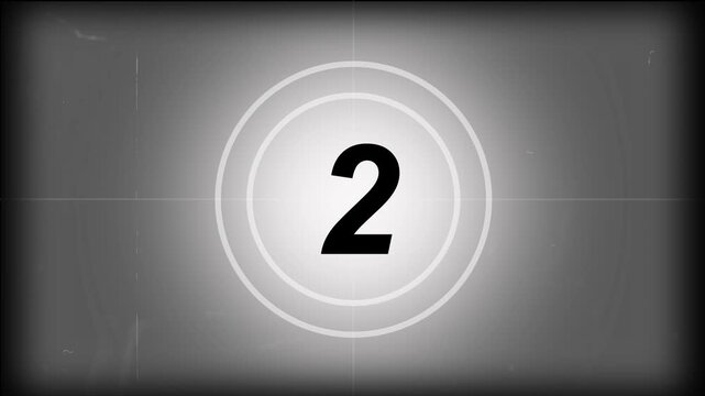 Vintage old projected film head leader with real time 6-0 countdown clock, worn damage marks scratches and film grain for retro cinema intro projects