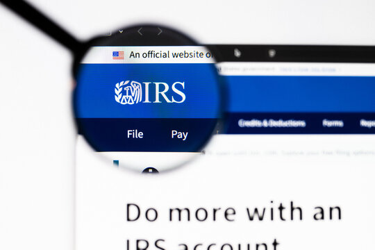 Milan, Italy 2026, 20 Apr Closeup of Internal Revenue Service IRS website on a laptop screen. Internal Revenue Service IRS logo under a magnifying glass.