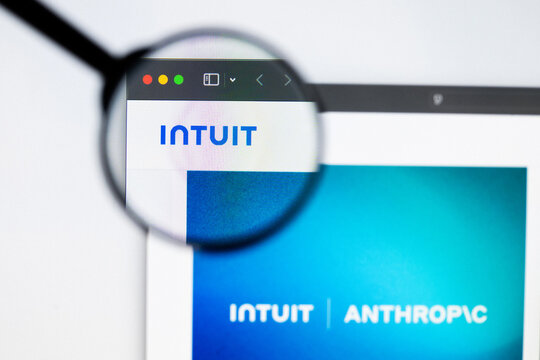 Milan, Italy 2026, 20 Apr Closeup of Intuit website on a laptop screen. Intuit logo under a magnifying glass.