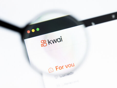 Milan, Italy 2026, 20 Apr Closeup of kwai website on a laptop screen. kwai logo under a magnifying glass.