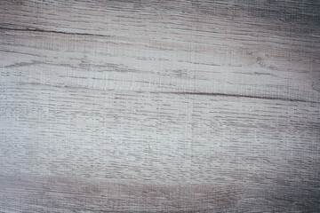 Fototapeta premium Light wood texture background with natural grain pattern and rustic surface. Wooden tabletop backdrop for product display, mockup, branding, advertising design, banner and copy space.