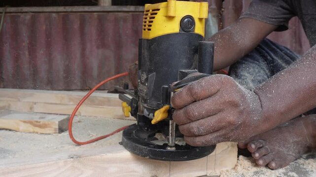 Wood router machine shaping edges with precision