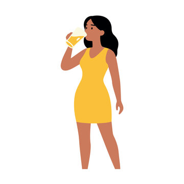 Woman in yellow dress drinking beer from a glass on white background