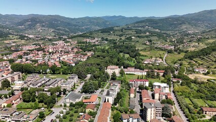 Fototapeta premium Drone aerial view of Pistoia historic center during summer morning light.