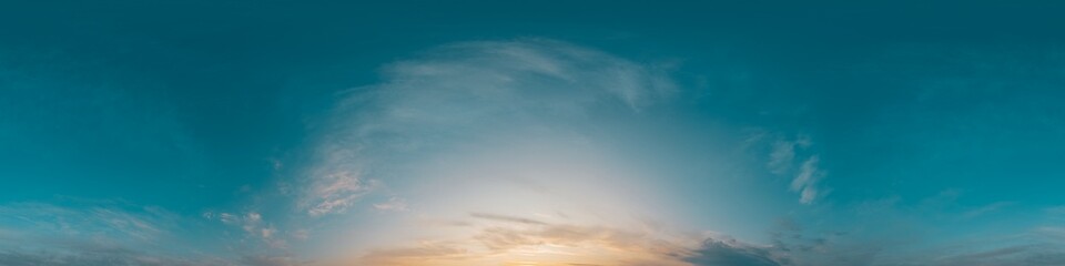 Fototapeta premium Sky panorama sunset showing clear blue atmosphere above golden horizon clouds with copy space for 3d environment map