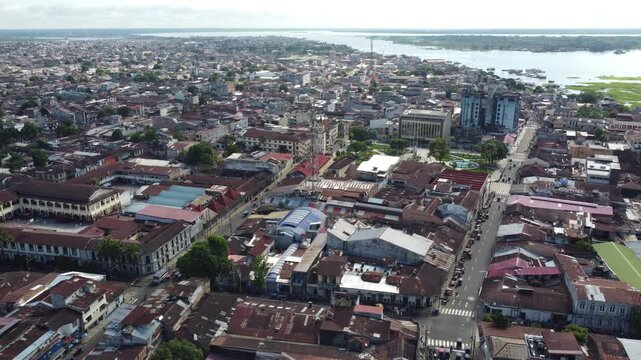A slow aerial view from high above showcasing the vibrant urban