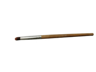 Fototapeta premium Makeup brush with wooden handle and silver ferrule