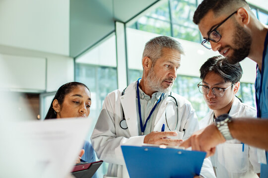 Doctors collaborating on patient case in modern hospital