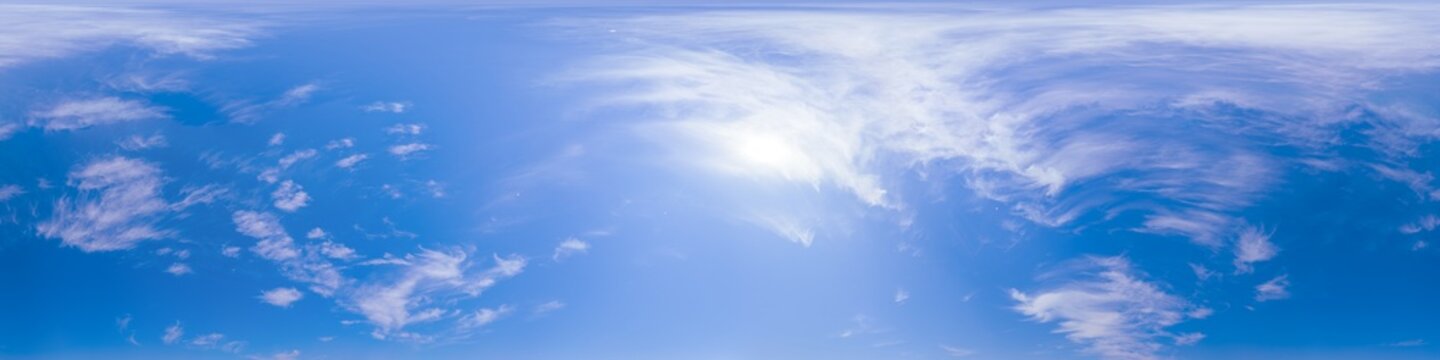 Panorama sky clouds with bright sun and cirrus formations across a seamless blue horizon for architectural visualization