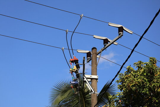 An Electric power transformer on utility pole