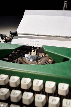Vintage typewriter with username and password typed on paper