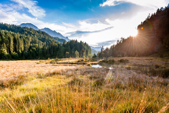 Sunset over the Riedener See wetland in Tyrol Austria