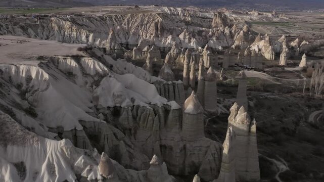 Drone view of G&ouml;reme, a historic town in Cappadocia famous for its fairy chimneys, cave houses and unique volcanic landscape.