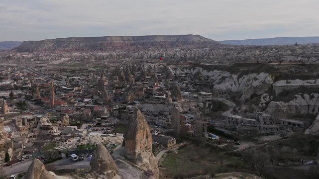 Drone view of G&ouml;reme, a historic town in Cappadocia famous for its fairy chimneys, cave houses and unique volcanic landscape.