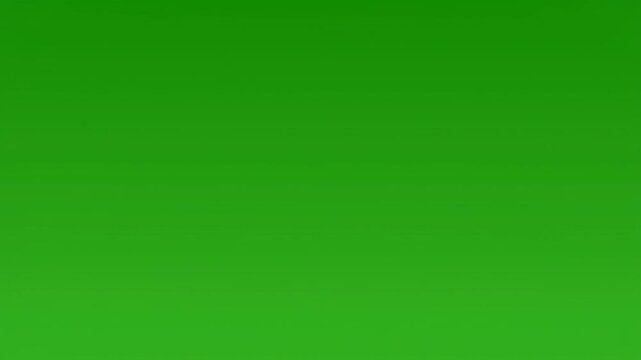 Water droplet falling creating concentric ripples on vibrant green background with subtle light diffusion