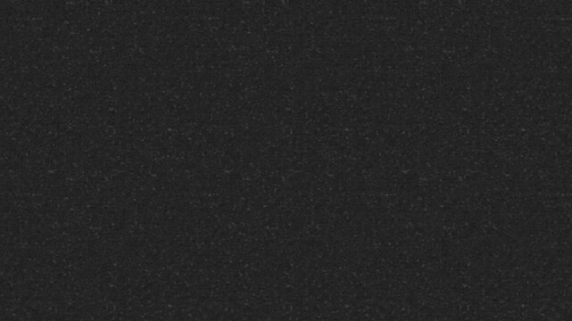 Vintage film noise overlay. Authentic black and white dust, grain