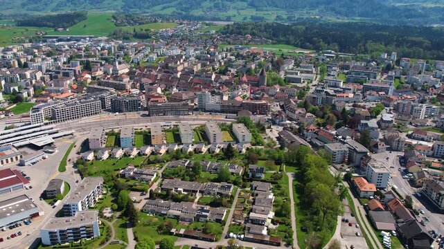 An aerial view beside the city and e old town of Bulle in Switzerland on a sunny noon in spring.