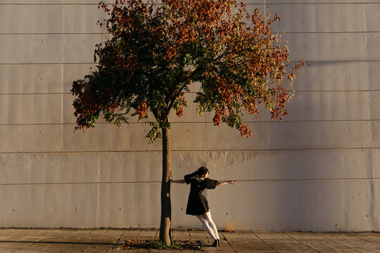 Woman with three at sunset
