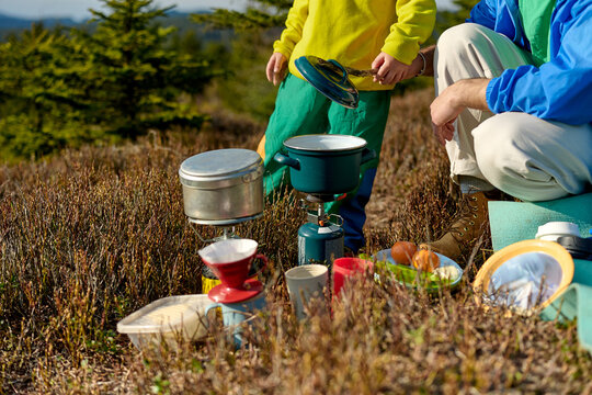 Preparing coffee during outdoor camping break
