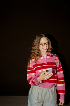 Smiling phone user
