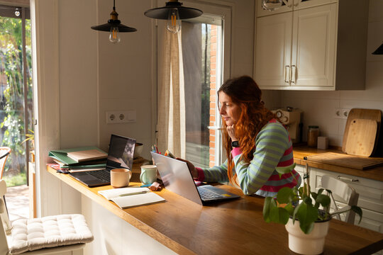 Working From Home at a Kitchen 
