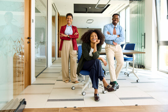 Happy businesspeople in a modern office space